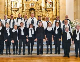 Txorierriko Gabon kantak ADELA elkartearen alde domekan Lezaman